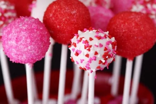 https://www.lovefromtheoven.com/wp-content/uploads/2012/02/pink-and-red-cake-pops-500x333.webp