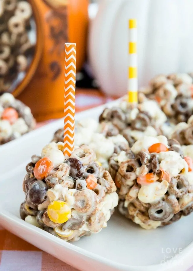 Chocolate Peanut Butter Cheerios Popcorn Balls • Love From The Oven