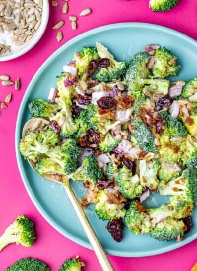 broccoli salad on a blue plate