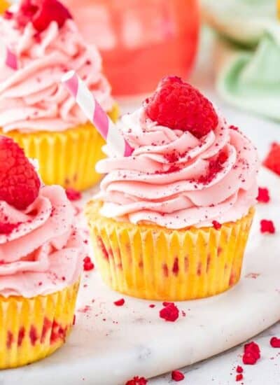 raspberry lemonade cupcakes on a white table