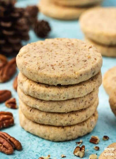 a stack of pecan sandies cookies