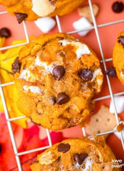 a pumpkin s'mores cookie on a cooling rack