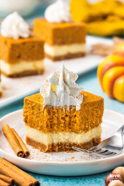 Pumpkin Cheesecake Bars • Love From The Oven