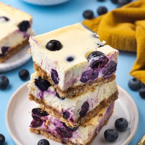 A stack of blueberry cheesecake bars