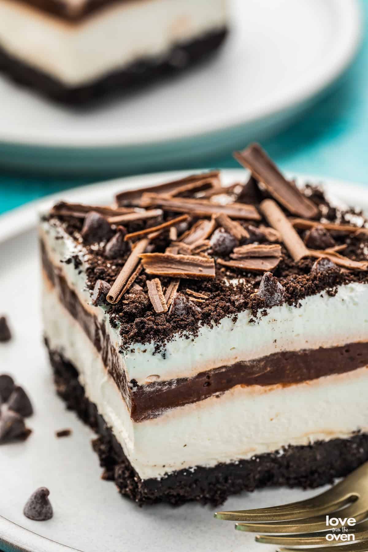 A close up photo of a slice of chocolate lasagna.