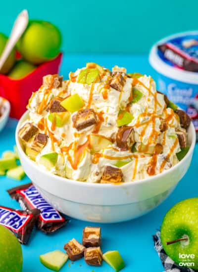 A bowl of snickers apple salad.